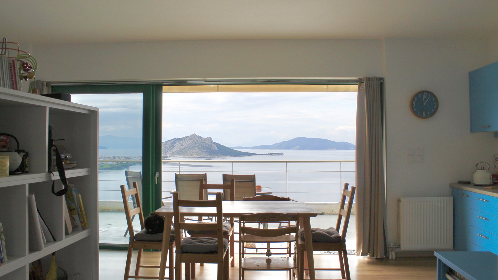 View from the dining table on the 4th floor of Eucalyptus Duplex directly to Moni and Agistri islands in Aegina, Greece